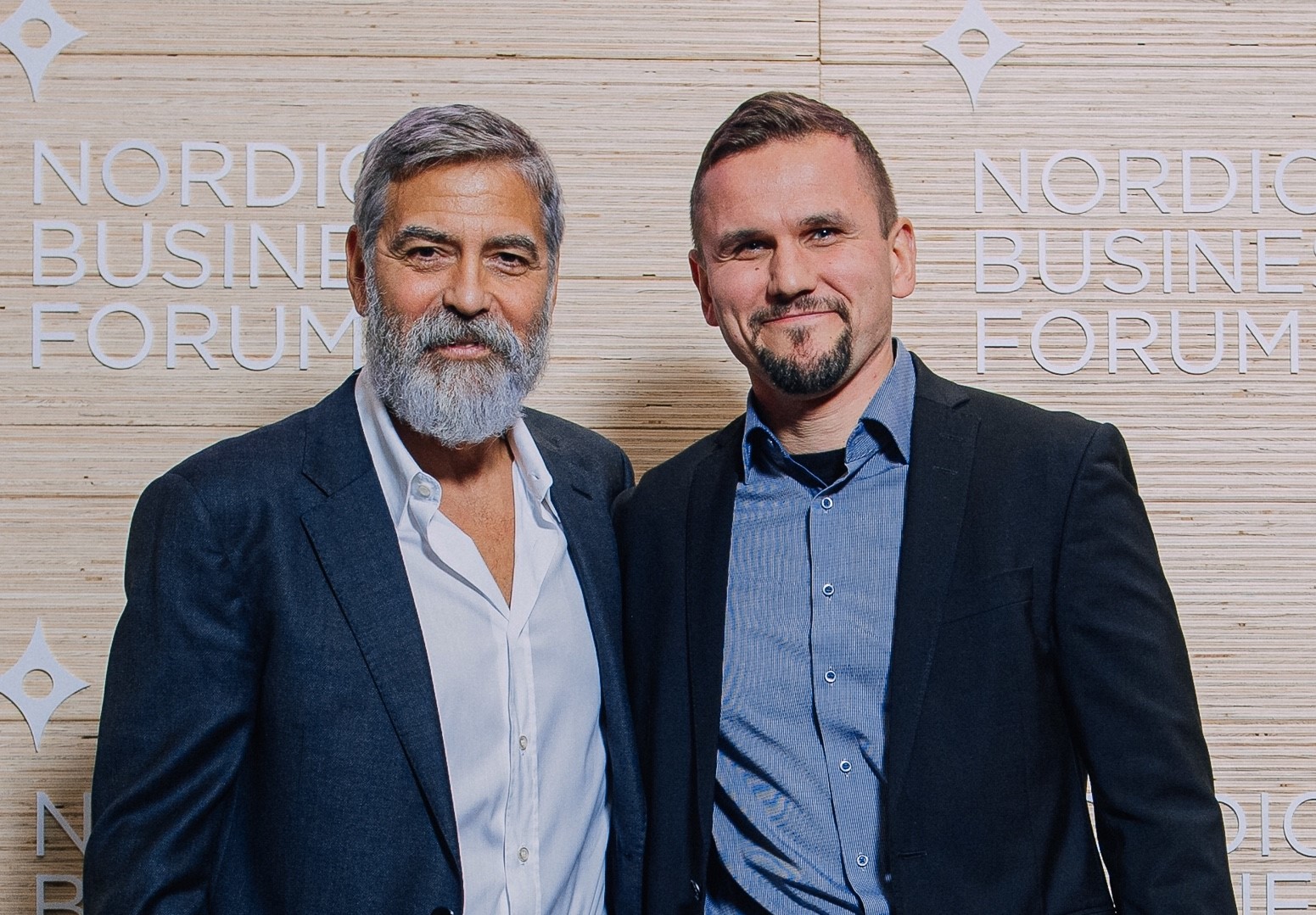 Kuva: George Clooney ja Timo Metsola Nordic Business Forum –tapahtumassa 2019. (Kuva: Nordic Business Forum)